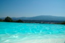 Prachtig uitzicht vanuit het zwembad, richting het dal van de Arno.
